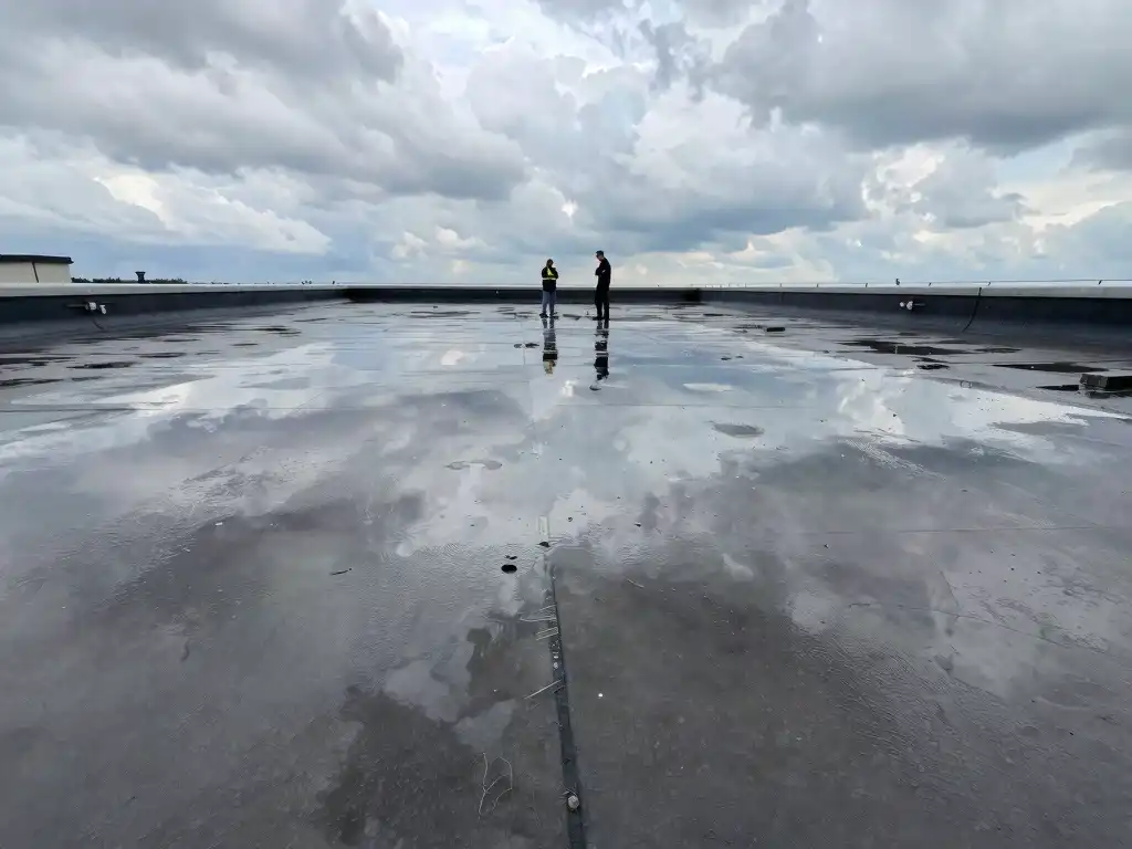 Suffolk County NY flat roof affected by heavy rain and climate exposure